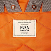 roka-canfield-b-medium-recycled-nylon-backpack---jaffa-orange-35907368