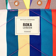 Roka Canfield B Mittelgroßer Rucksack aus recyceltem Canvas – breiter, bunter Streifen