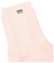 Roka Wallace Crew Socken – Transcendent Pink