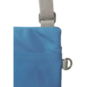 Roka Chelsea Sustainable Nylon Pocket Sling Bag - Seaport Blue