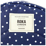 Roka Paddington B Umhängetasche aus recyceltem Canvas – Navy Polka Dot