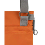 Roka Stratford Recycled Nylon Sling Bag - Burnt Orange